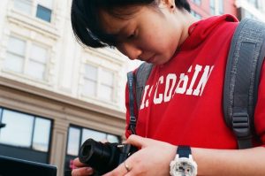 Ariel Yang with a camera