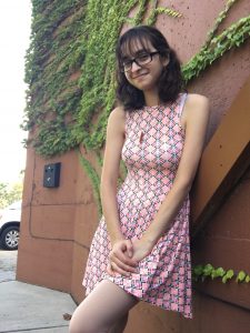 Rachel Litchman, Student Spotlight, next to the Red Gym on campus