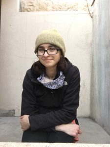 Rachel Litchman, Student Spotlight, seated.