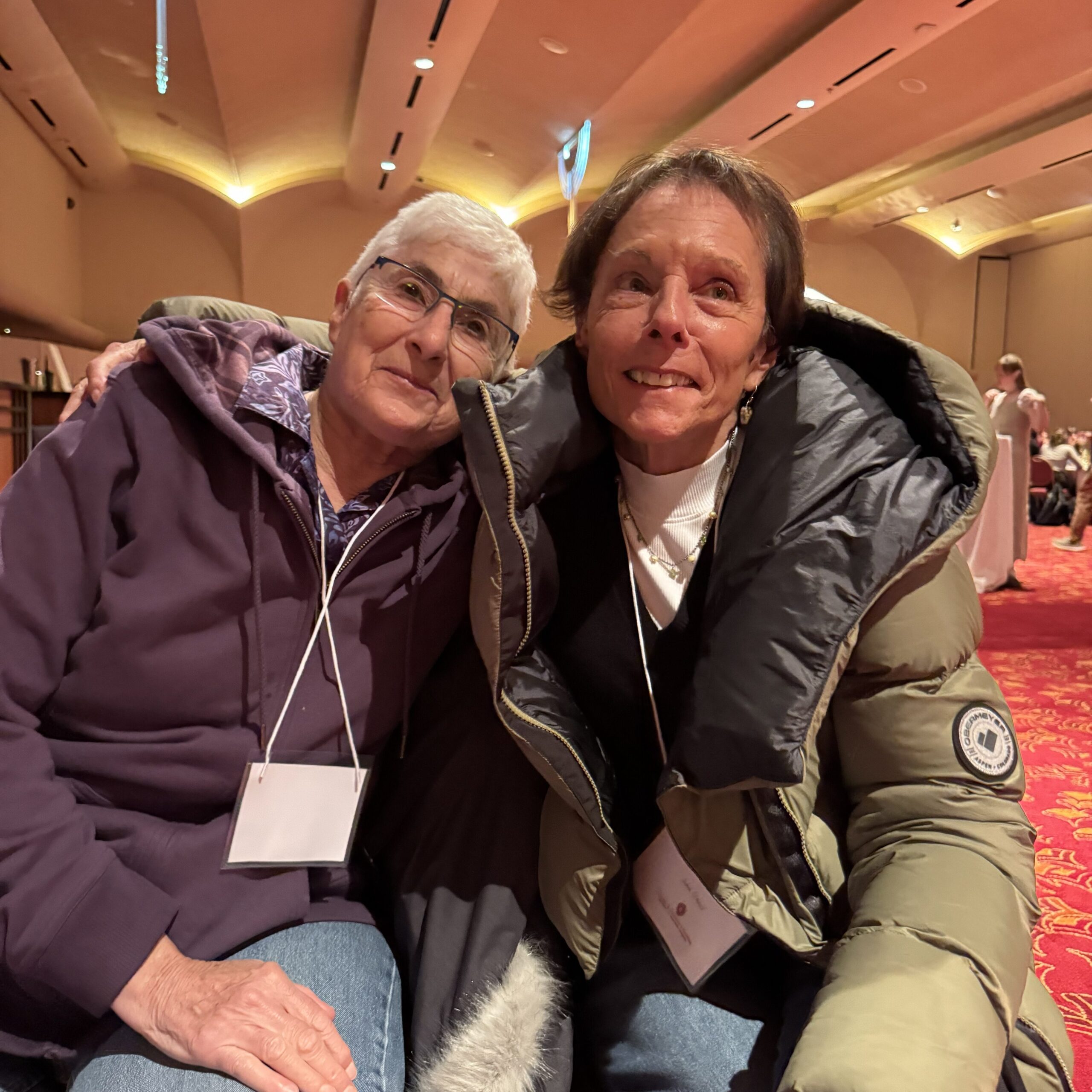 Image of two celebration attendees.